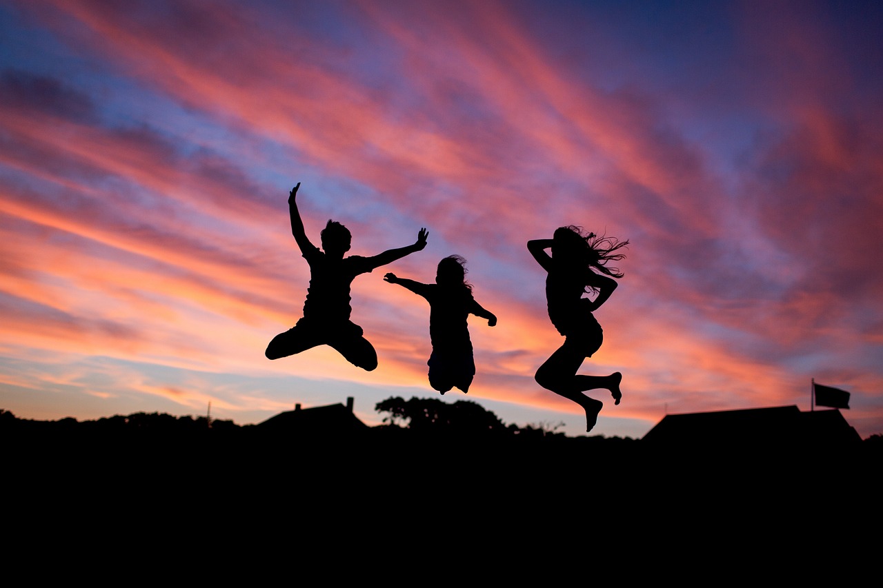 3 people during a sunset in a jump mid air expressing joy as a healthy habit 
image by fancycrave1