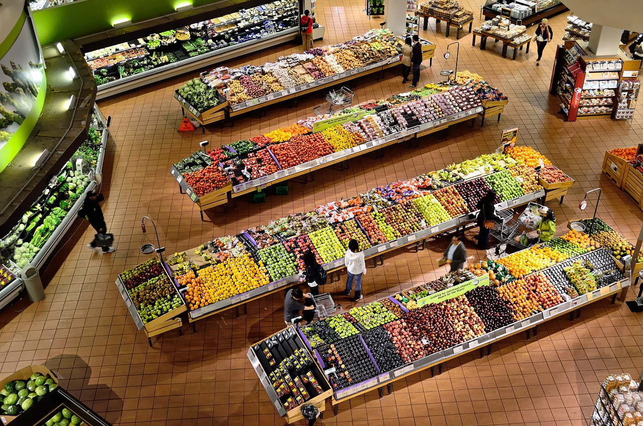 Market with Various options of colorful veggies and fruits. image by ElasticComputeFarm